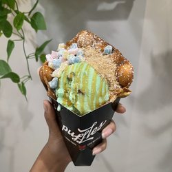 Puffles - BYO Pistachio Single Scoop with Mochi, Graham Cracker Crumbs and Caramel Drizzle