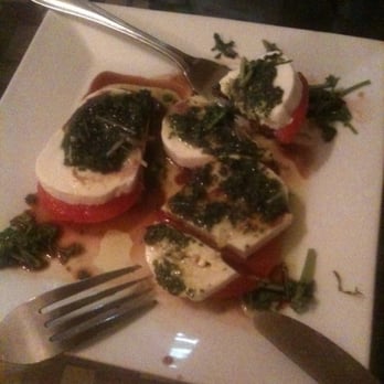 Da Luigi - Caprese! We unfortunately already cut into its pristine beauty. - Italian Near Me - San Juan, Puerto Rico