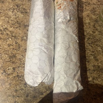 Salsa Verde Restaurant - Two supremo burritos, completely different size. - Mexican Near Me - Tucson, Arizona