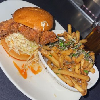 Yard House - Nashville Hot Chicken Sandwich garlic fries - Bars Near Me - Roseville, California Yard House - Nashville Hot Chicken Sandwich garlic fries - Bars Near Me - Roseville, California