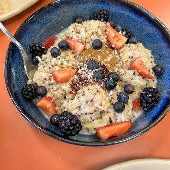 Snooze, an A.M. Eatery - Almond Butter Coconut Porridge - Breakfast & Brunch Near Me - Dunwoody, Georgia Snooze, an A.M. Eatery - Almond Butter Coconut Porridge - Breakfast & Brunch Near Me - Dunwoody, Georgia