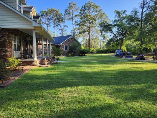 spring clean up - This was a first time customer. The first day was cleaning up the yard and mowing grass. Then we spent a couple hours the next day trimming bushes.