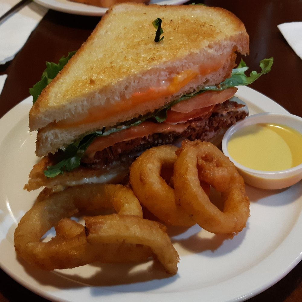 Burger Heaven - Half of insanity burger and onion rings - Burgers Near Me - New Westminster, British Columbia