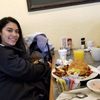 Peach Valley Cafè - Sherri liking her breakfast - Cafes Near Me - Ormond Beach, Florida Peach Valley Cafè - Sherri liking her breakfast - Cafes Near Me - Ormond Beach, Florida