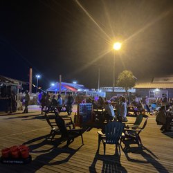 Outdoor seating and games. Two new sand volleyball courts.