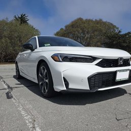 Picture of the front of a Pearl White 2026 Honda Civic Picture of the front of a Pearl White 2026 Honda Civic