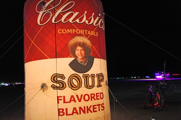 Photo of Soup Flavored Blankets - Black Rock City, NV, US. Inflatable soup can marking Soup Flavored Blankets at Burning Man 2015 (photo credit: Matt Werner)