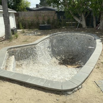 Lush Remodeling - Custom concrete pool coping dark gray modern edge pool remodeling backyard renovation - General Contractors Near Me - Los Angeles, California