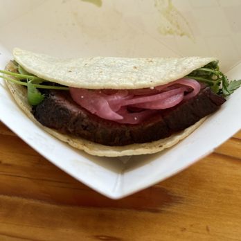 Damon's Real Texas BBQ - Brisket taco with an incredible cilantro lime sauce. You get three per order. - Barbeque Near Me - Wharton, Texas