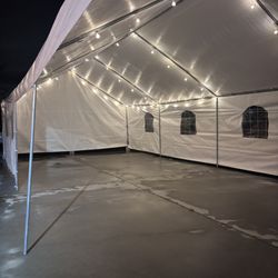 K&B Party Rentals - 20x40 canopy with back and side walls along with bistro lights