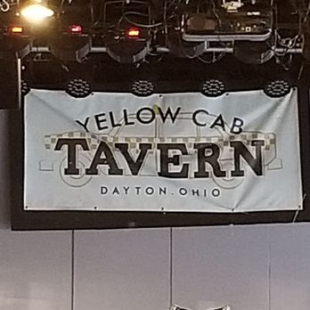 Yellow Cab Tavern - a stage with a yellow cab tavern sign - Bar Crawl Near Me - Dayton, Ohio Yellow Cab Tavern - a stage with a yellow cab tavern sign - Bar Crawl Near Me - Dayton, Ohio