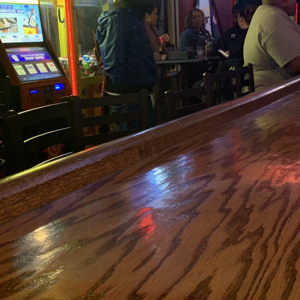 Walt's Tavern - a man sitting at a bar - Seafood Near Me - Elkton, Maryland