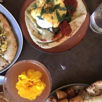 Byblos Miami - Poached Eggs and brunch spread - Mediterranean Near Me - Miami Beach, Florida