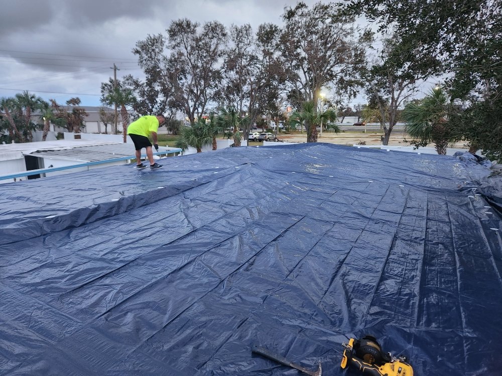 Slide of Rain Proof Roofing & Contracting