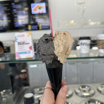 Bella Gelateria - black sesame and london fog (earl gray) on a charcoal cone - Ice Cream & Frozen Yogurt Near Me - Vancouver, British Columbia Bella Gelateria - black sesame and london fog (earl gray) on a charcoal cone - Ice Cream & Frozen Yogurt Near Me - Vancouver, British Columbia