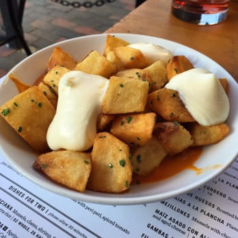 Toro - Patatas bravas with a fairly mild bravas sauce - Tapas Bars Near Me - Boston, Massachusetts Toro - Patatas bravas with a fairly mild bravas sauce - Tapas Bars Near Me - Boston, Massachusetts