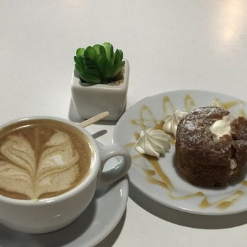 Melao Coffee Shop - Almond latte with carrot cake - Coffee & Tea Near Me - Ponce, Puerto Rico Melao Coffee Shop - Almond latte with carrot cake - Coffee & Tea Near Me - Ponce, Puerto Rico