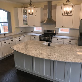 Marble Line - a large kitchen with a center island - General Contractors Near Me - Brookshire, Texas Marble Line - a large kitchen with a center island - General Contractors Near Me - Brookshire, Texas
