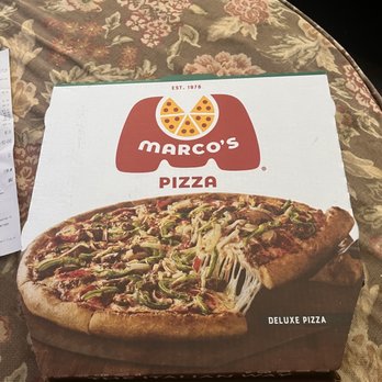 Marco's Pizza - a pizza box on a table - Pizza Near Me - Royal Oak, Michigan Marco's Pizza - a pizza box on a table - Pizza Near Me - Royal Oak, Michigan