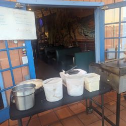 Altamiranos - You can order tacos outside and then dine at a table or at the bar. The bar is great when I'm alone.