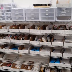 Down The Street IT - Newly reorganized storage area, stocked and ready for your phone and iPad screen replacements!