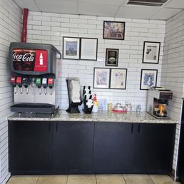 Self serve soda, napkins, coffee Self serve soda, napkins, coffee