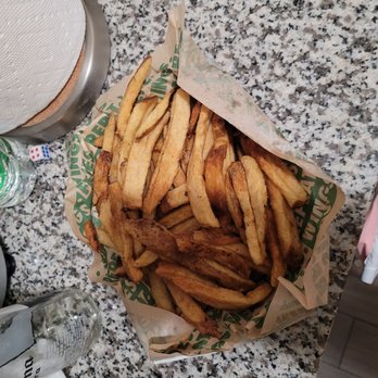 Wingstop - french fries in a paper bag - Chicken Wings Near Me - Queens, New York