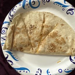 This is how my Chicken Quesadilla came out and one of the sides has NO FILLING