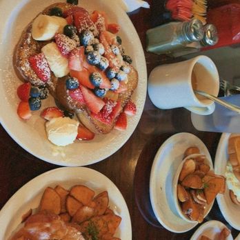 Shelly's Cafe - French Toast with Shelly's toppings. Side of bacon and home fries. - Breakfast & Brunch Near Me - Tampa, Florida Shelly's Cafe - French Toast with Shelly's toppings. Side of bacon and home fries. - Breakfast & Brunch Near Me - Tampa, Florida