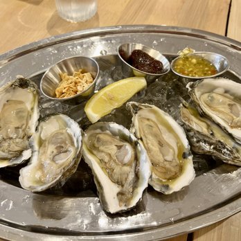 When In Bangkok - Happy hour oysters with special sauce. So good! - Thai Near Me - Flushing, New York When In Bangkok - Happy hour oysters with special sauce. So good! - Thai Near Me - Flushing, New York