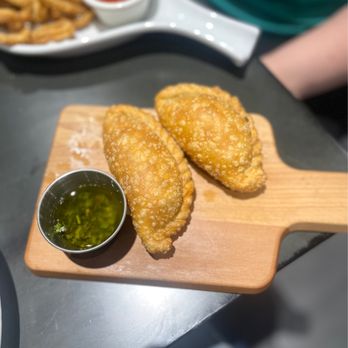 Fuegos Del Sur - Kendall - Braised beef empanadas - delicious - Argentine Near Me - Kendall, Florida Fuegos Del Sur - Kendall - Braised beef empanadas - delicious - Argentine Near Me - Kendall, Florida