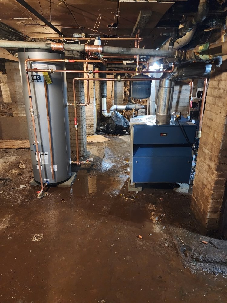 Slide of TT and CA Plumbing and Heating