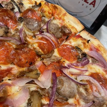Joe's Pizza - Slice of Supreme pizza - Pizza Near Me - Miami, Florida