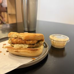 This is the mushroom boi breakfast sandwich.  Hell yeah I like a secret sauce and hell yeah I like crystal hot sauce packs (see drips).
