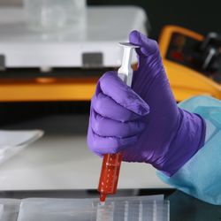Filling troche molds with a syringe