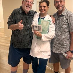 Martha Holzworth, DPM-Stride Forward Medical Group - Me, Dr Holzworth and my husband. Yup, all smiles!  Outstanding sensitive and professional care.