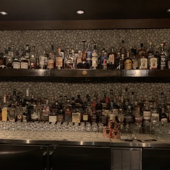 The Double Barrel - a row of liquor bottles - Bars Near Me - Beverly Hills, California The Double Barrel - a row of liquor bottles - Bars Near Me - Beverly Hills, California