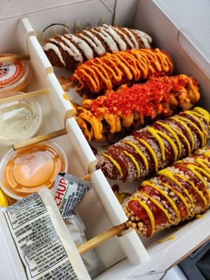 Two Hands Corn Dogs by null