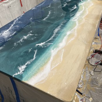 Custom Floors & Walls - a painting of a beach - Flooring Near Me