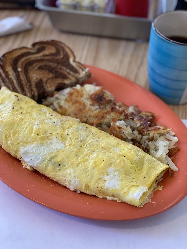 Ellie's 12 Tables Logo