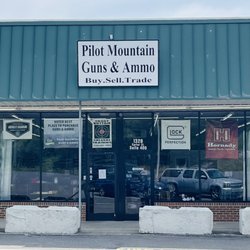 Pilot Mtn Guns and Ammo - Located in Mt Airy beside Harbor Freight