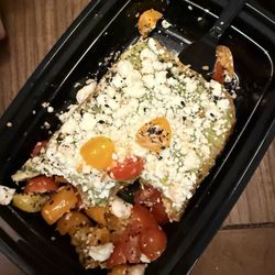 Pablos Bowls - Avocado toast with heirloom tomatoes and feta.