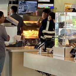 customers at the counter of a fast food restaurant
