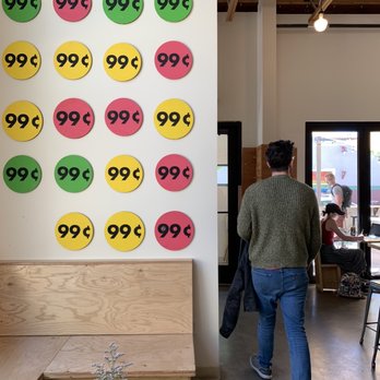 Clyde Coffee - Seating area with some interesting art - Coffee & Tea Near Me - Missoula, Montana
