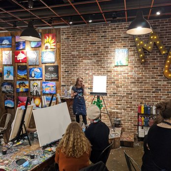Muse Paintbar - The lead artist on mic guiding us along... - Art Classes Near Me - Richmond, Virginia