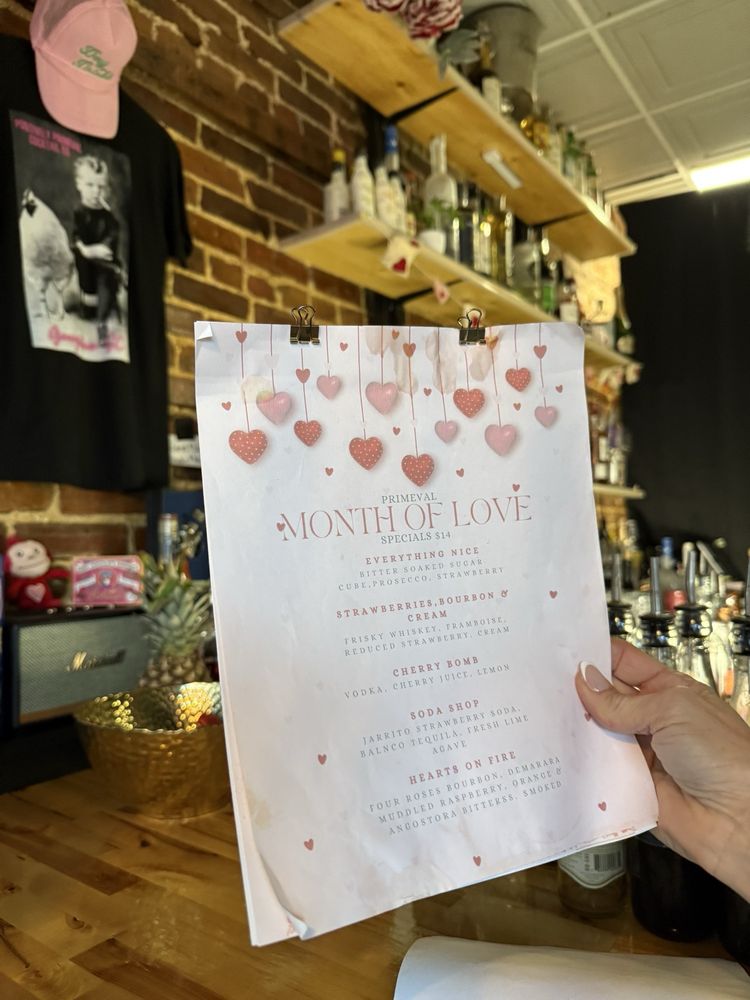 Positively Primeval Cocktail Logo