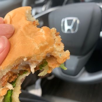 Chick-fil-A - ows a hand holding a sandwich - Fast Food Near Me - Vancouver, Washington Chick-fil-A - ows a hand holding a sandwich - Fast Food Near Me - Vancouver, Washington