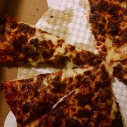 This was the pizza they delivered to our residence. What a joke