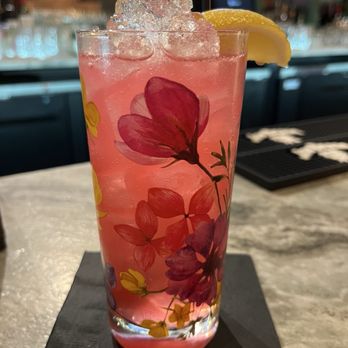 Primrose Bar & Lounge - Paxton's Planet. Vodka & hibiscus, yum. - Cocktail Bars Near Me - Durham, North Carolina