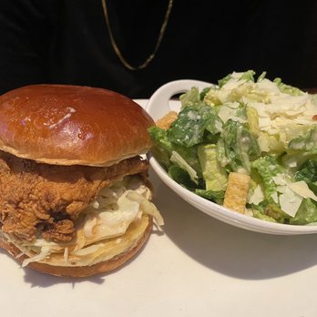 Yard House - Nashville Hot Chicken Sandwich with a side of Caesar salad (these two pair so well together! The salad is so fresh & tasty!) - Bars Near Me - Houston, Texas